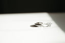 Sleek silver square-cut diamond ring, luxury jewelry for engagement.