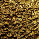 Shiny textured gold leaf with intricate organic patterns and metallic sheen inspired by 18k gold fine jewelry