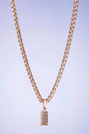 A rose gold rectangular pendant necklace with pave set clear and blue stones in fine 18k gold jewelry.