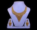 Gold jewelry fine jewelry 18k gold golden ornate necklace with intricate filigree and matching earrings on white bust