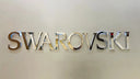 Chrome Swarovski logo on elegant gold rings for men