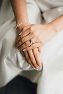 A gold wedding band with a central diamond cluster in 18k gold exemplifies art gold jewelry sophistication