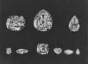 A collection of polished faceted diamonds in various cuts showcasing fine jewelry tradition and art gold craftsmanship