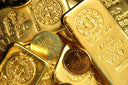 Golden 1 kilo fine gold bars from Argor Switzerland highlighting 18k gold quality for fine jewelry collections.