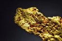 a close up of a gold nugget