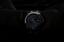 Ethical Longines watch with blue dial on wrist, ethical jewelry luxury.