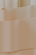 a close up of a roll of white paper