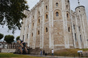 The tower of london is a historic stone fortress with arched windows symbolizing crown jewels and fine jewelry heritage.