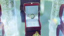 Gold-toned bracelet with circular centerpiece in red velvet box highlighting historical art deco style from everett jewelry store
