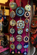 A display of colorful jewelry in a store