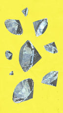 Shiny faceted diamond fragments in varying sizes on yellow background in article about famous cursed gems and engagement rings.