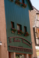 a building that has a sign on the side of it