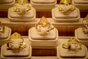 A golden finely engraved ring showcasing art gold’s approach to fine jewelry care in massachusetts guide