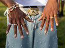 18k gold jewelry rings with pearls on dark skin