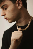 Gold-colored thick cuban link chain necklace as an iconic statement accessory from everett jewelry store collections