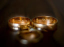 Two engraved 18k gold wedding bands, fine jewelry backsides