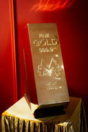 A polished gold bar engraved with fine gold 999.9 and 1000 g net weight for art gold jewelry and collectibles.