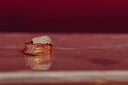 Gold-plated ring with pave-set diamonds and an ornate geometric design exemplifies fine jewelry in ancient civilizations.
