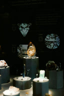A translucent amber-colored crystal specimen with natural surface and inclusions featured in royal jewels and art gold jewelry designs