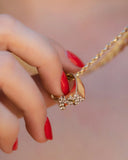 Elegant 18k gold heart pendant necklace with diamond accents