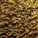 a close up view of a gold textured surface