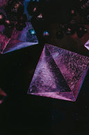 Translucent purple crystal rivaling Hope Diamond in art gold jewelry