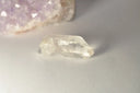 Faceted quartz crystal in royal jewels for engagement rings
