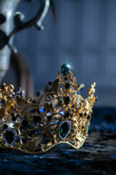 a gold crown sitting on top of a table