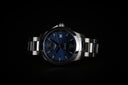 A sleek Longines silver watch with blue dial and stainless steel bracelet showcased at everett jewelry store.