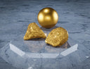Shiny gold sphere with polished reflective surface showcased as art gold jewelry in marvels of nature article