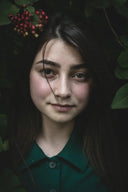 a girl with a flower in her hair