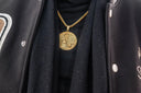 Gold lion pendant on a braided 18k gold chain showcasing unique fine gold jewelry design for personalized gifts
