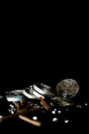 several round silver-colored coins