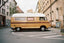 brown van parked on the side of the road