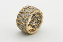 gold round ornament on white surface