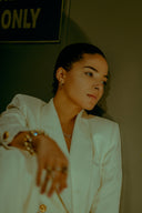 man in white suit jacket