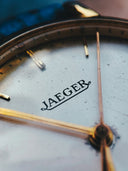 white and black analog clock