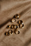 gold rings on gray textile