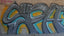 a wall with some graffiti on it