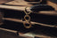 a close up of a key chain on a drawer