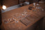 a table topped with lots of different types of jewelry