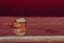 a couple of gold rings sitting on top of a table