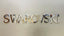 the word swaroski written in cut out letters