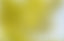 a blurry image of a yellow and blue sky