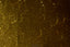 a close up of a window with yellow lights