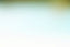 a blurry image of a green and yellow background