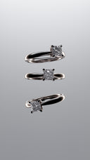 A couple of rings that are sitting on a table