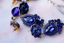 A bunch of jewelry that is laying on a table