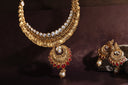 A pair of necklaces and a pair of earrings