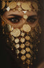 A woman is wearing golden jewelry.